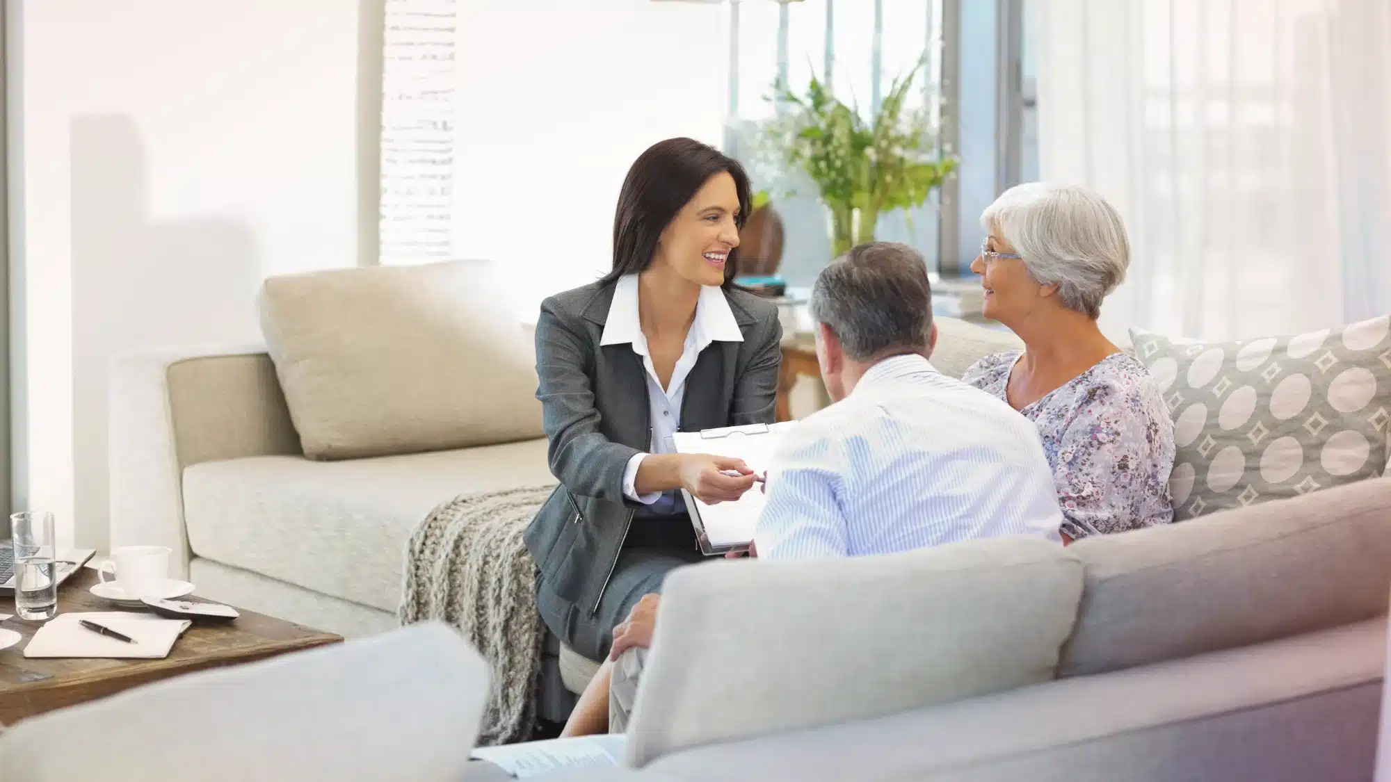 Florida retirement planner meeting with a couple to discuss retirement savings, investment strategies, and long-term financial goals